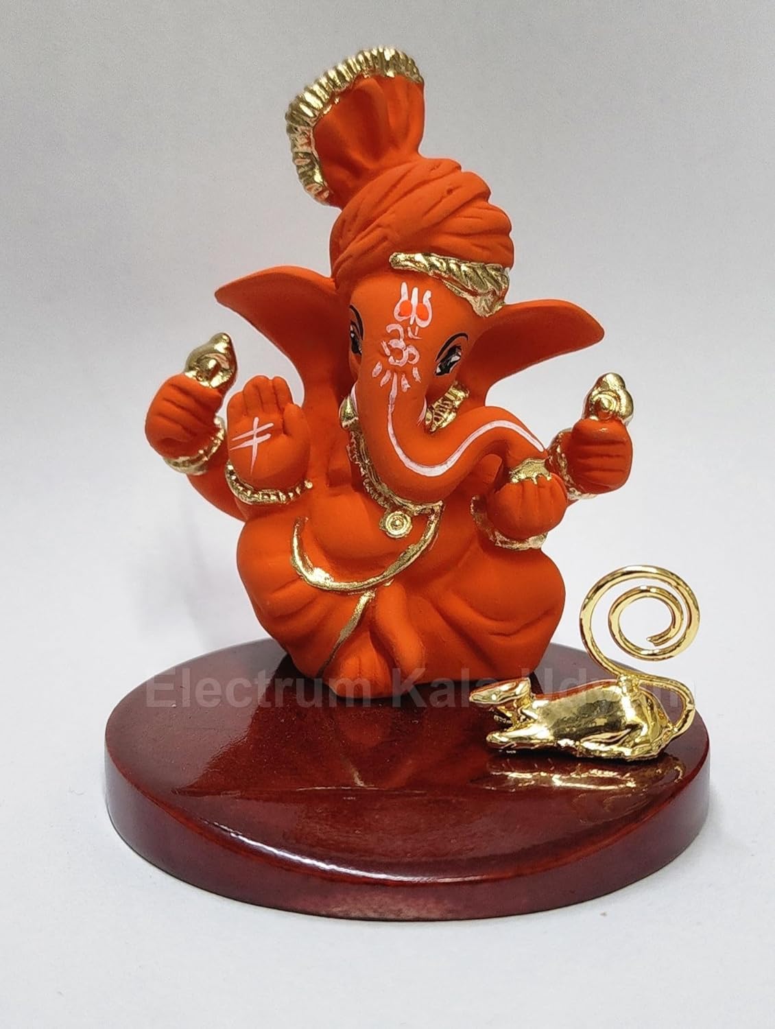 Orange Ganesha Idol with Gold Plated Mooshak